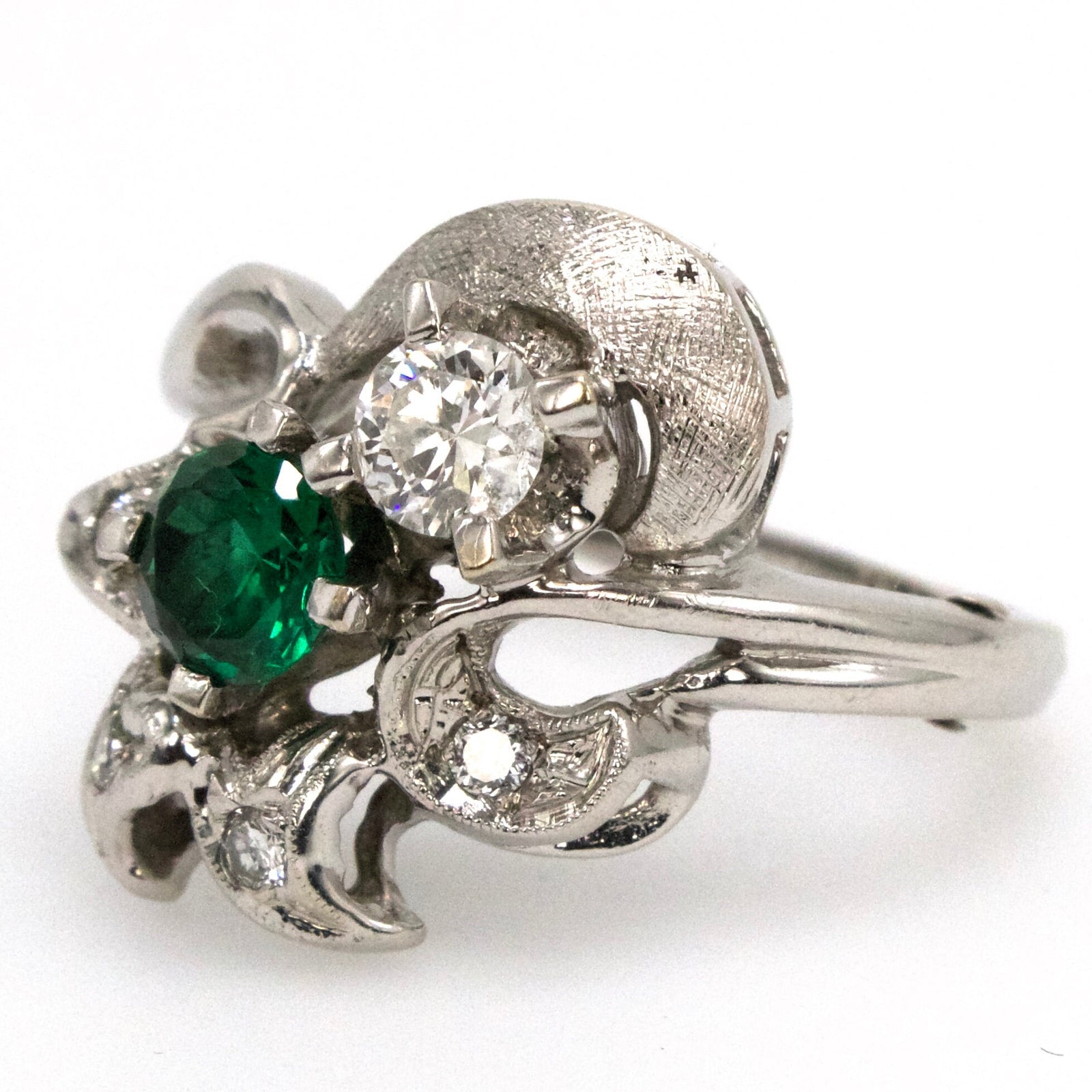 Midcentury Emerald and Diamond Bypass Ring with Star Motif