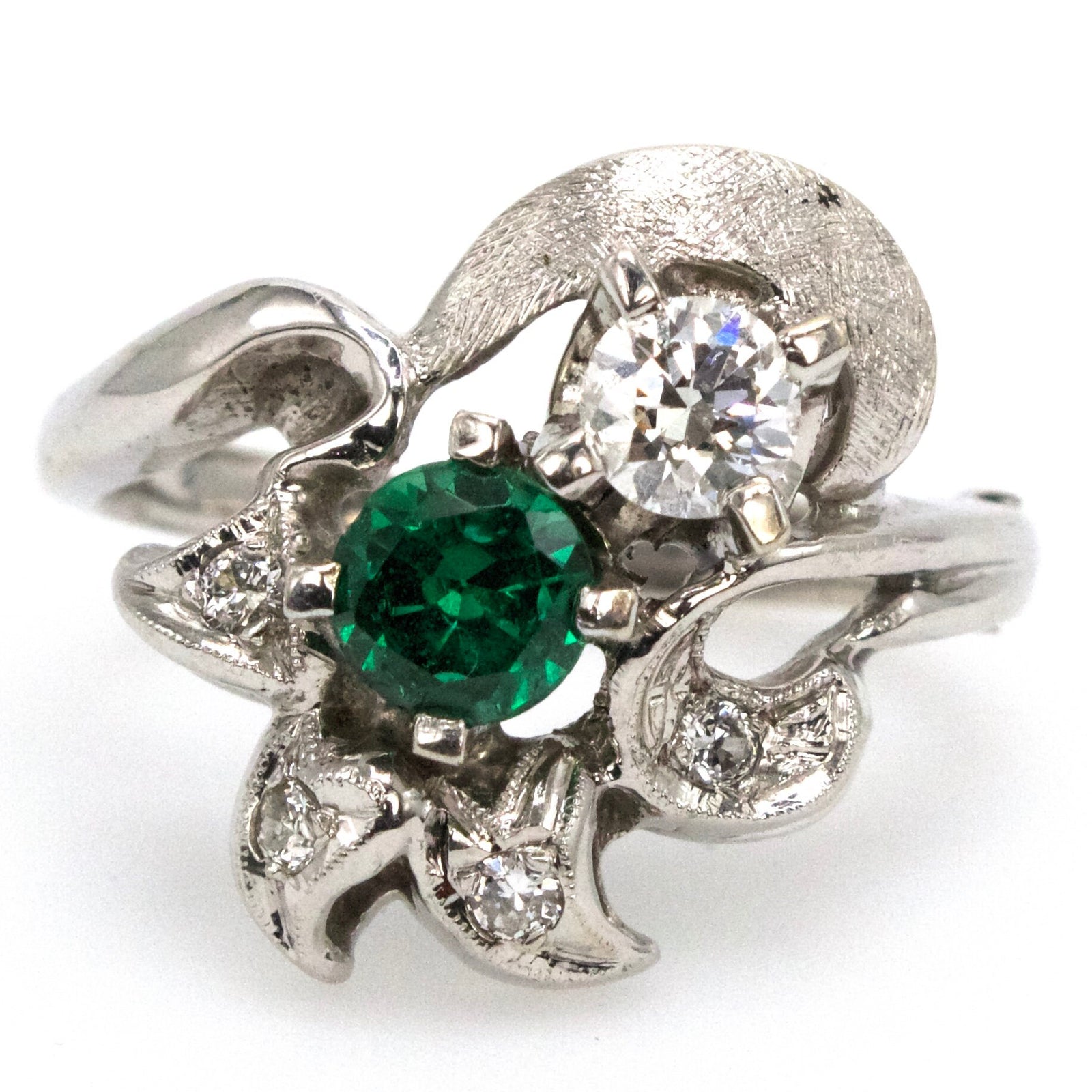 Midcentury Emerald and Diamond Bypass Ring with Star Motif