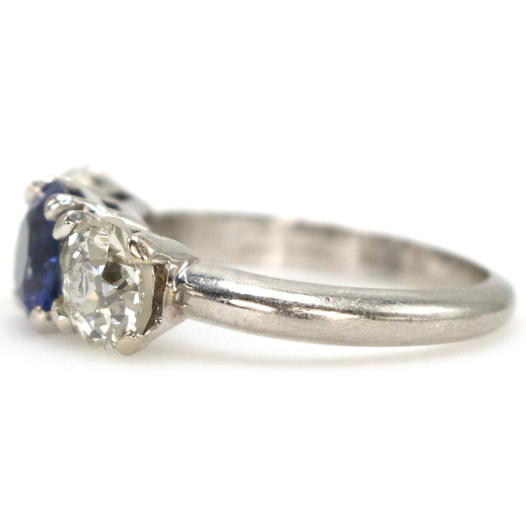 European Cut Diamond and Blue Sapphire Three Stone Ring in Platinum