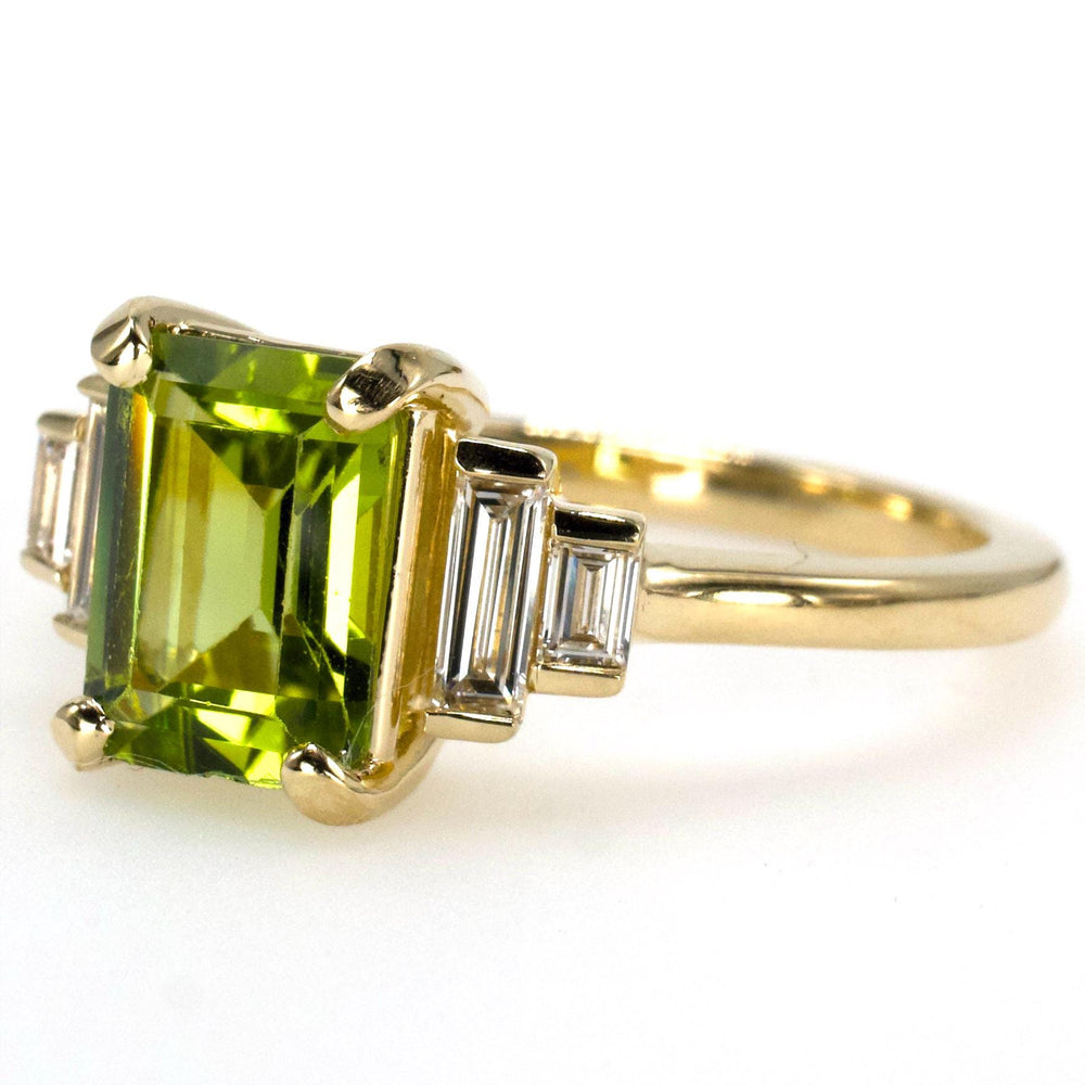 1.40 Carat Emerald Cut Peridot with Graduated Baguette Diamond Accents in Gold