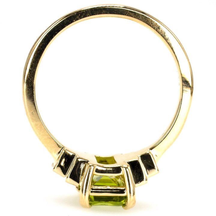 1.40 Carat Emerald Cut Peridot with Graduated Baguette Diamond Accents in Gold