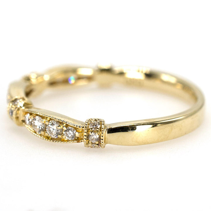 Cinched Yellow Gold and Diamond Wedding Band