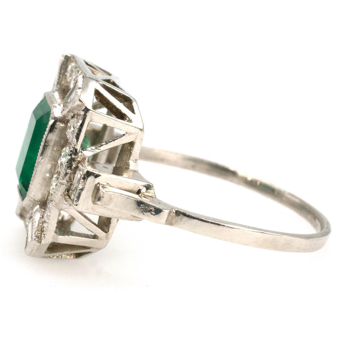 Estate 1.40 Carat Emerald Cut Emerald in Art Deco Style White Gold Setting with Diamond Halo