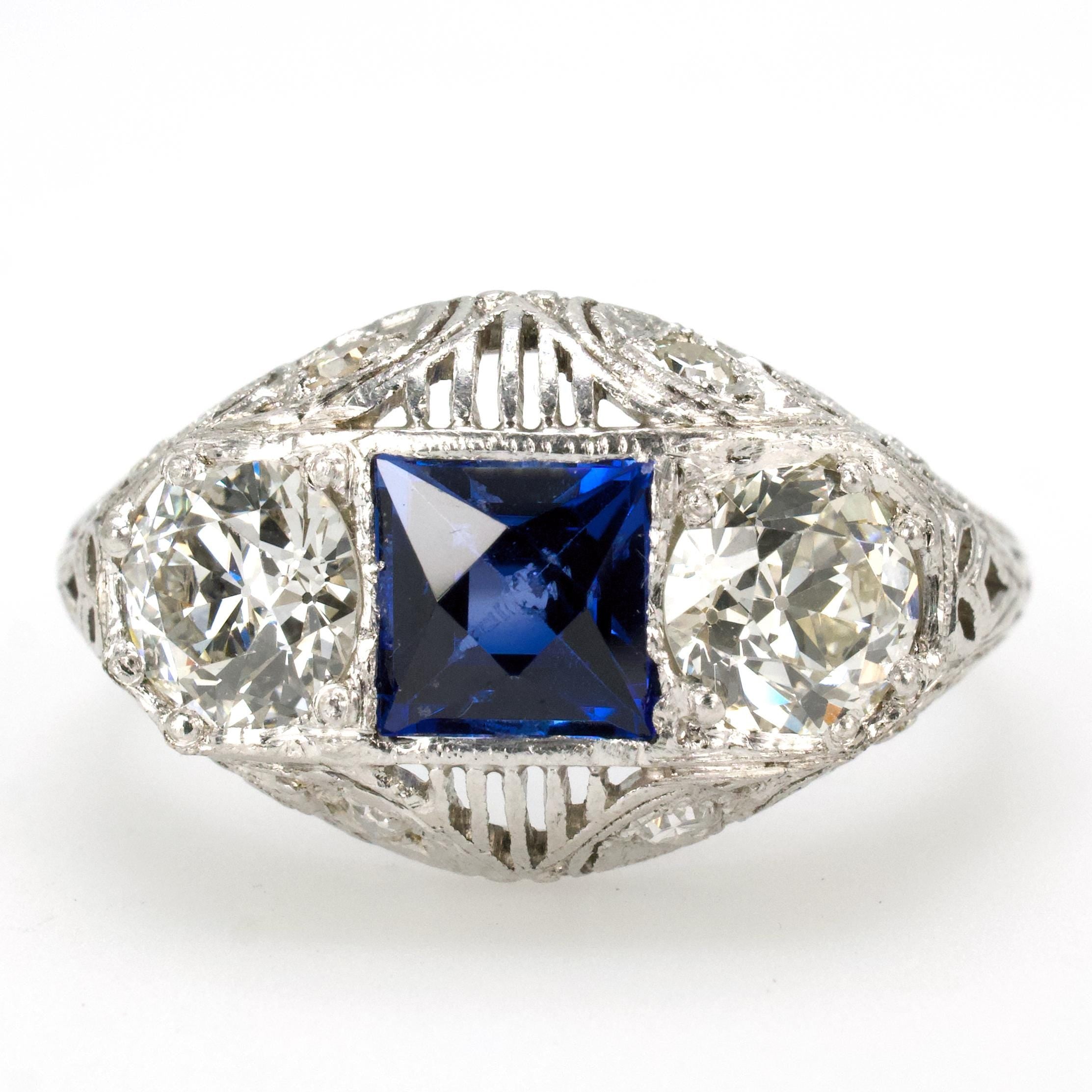 Edwardian Three Stone Platinum Filigree Ring with European Cut