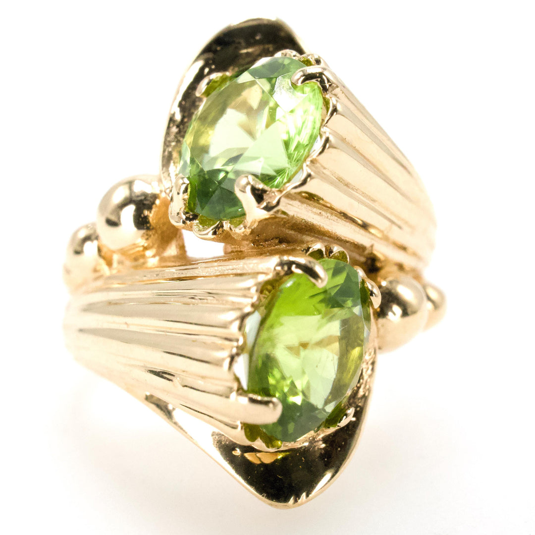 Unusual Two Stone Peridot Bypass Ring in 14K Yellow Gold