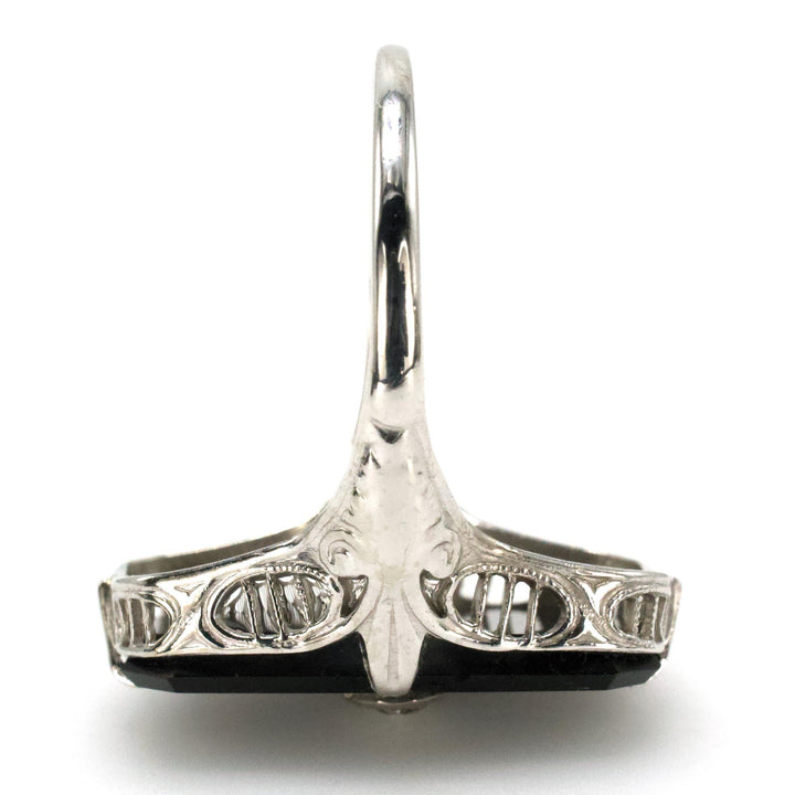 Antique White Gold Filigree Ring with Buff Top Onyx and Bezel set Diamond