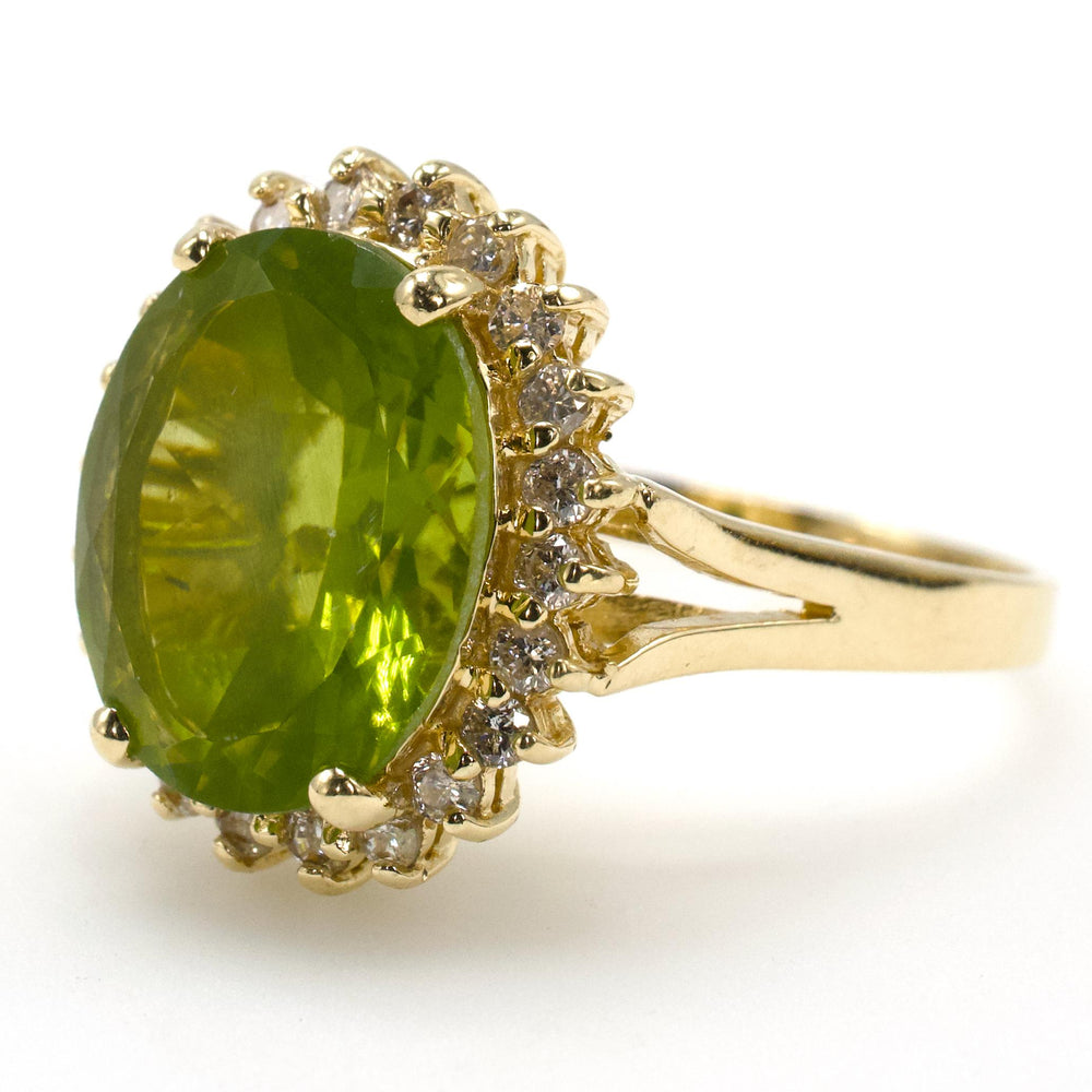 Vintage Oval Cut Peridot Ring with Diamond Halo and Split Shank in 14K Yellow Gold