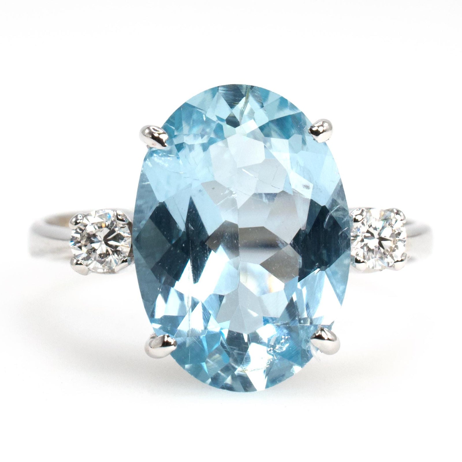 4.50 Carat Oval Cut Aquamarine Solitaire with Accent Diamonds in 18K White Gold