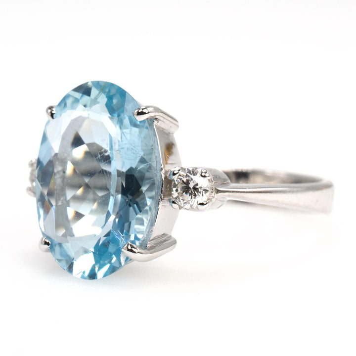 4.50 Carat Oval Cut Aquamarine Solitaire with Accent Diamonds in 18K White Gold