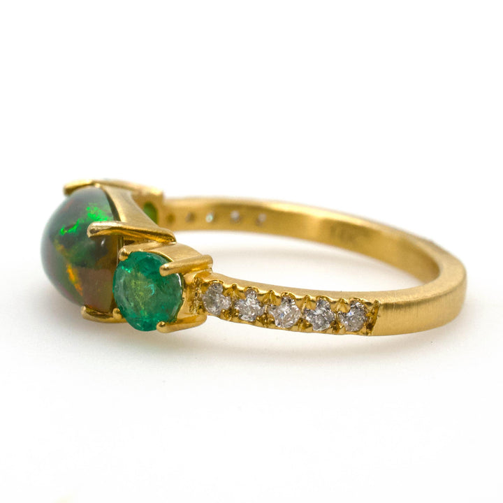 East-West Oblong Ethiopian Opal Ring with Emeralds in 14K Gold