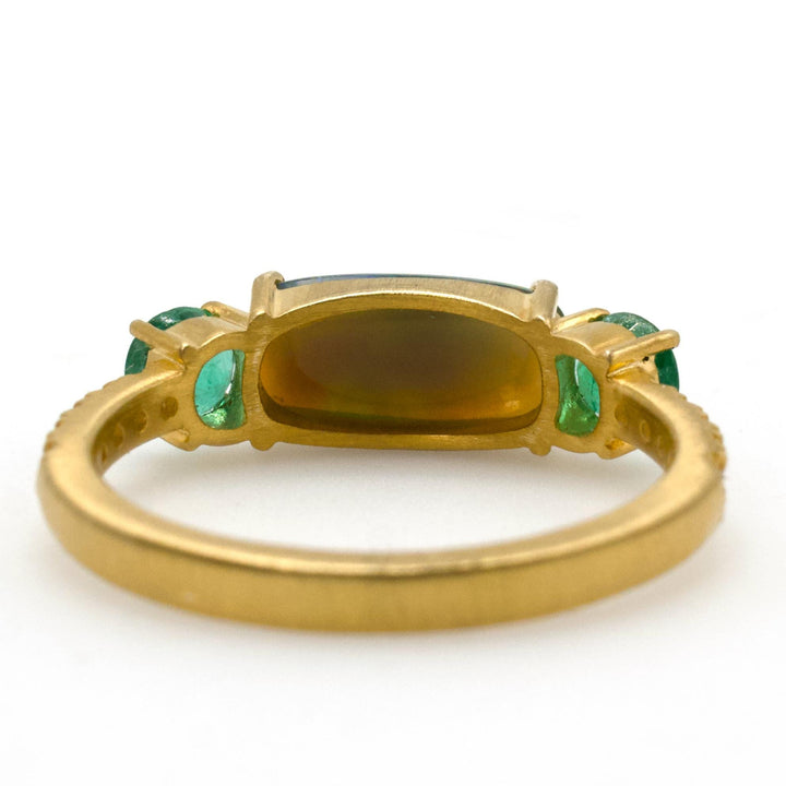 East-West Oblong Ethiopian Opal Ring with Emeralds in 14K Gold