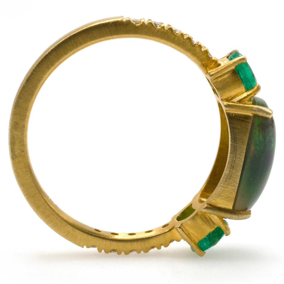 East-West Oblong Ethiopian Opal Ring with Emeralds in 14K Gold