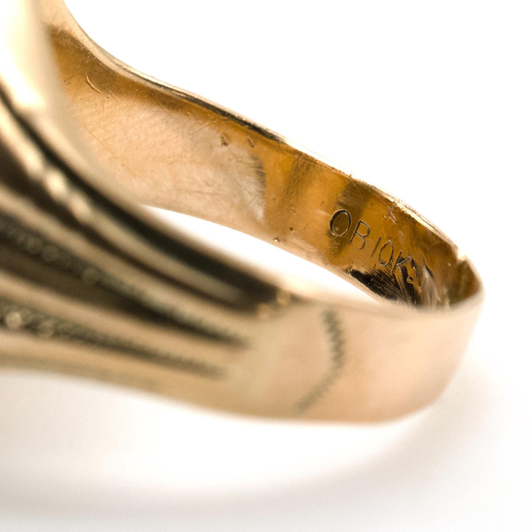 Ostby & Barton Gold Ring with Intaglio Profile of Soldier in Tiger's Eye (circa 1930s)