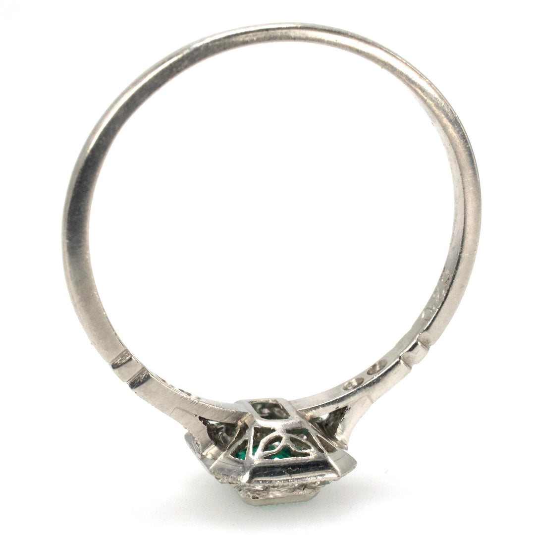 Petite Edwardian Style Emerald and Diamond Halo Ring in Platinum