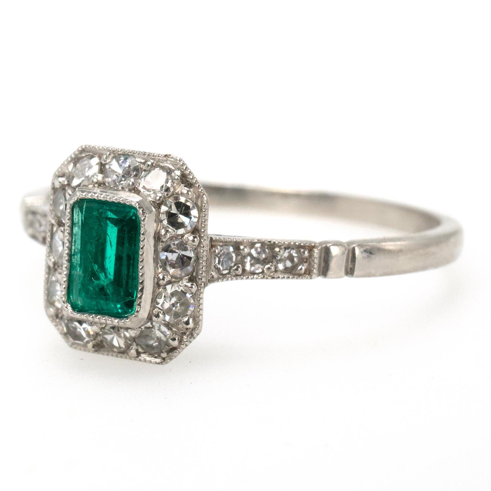 Petite Edwardian Style Emerald and Diamond Halo Ring in Platinum