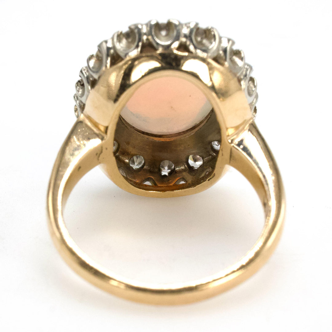 Vintage Gold Oval Opal Ring with Diamond Halo Surround