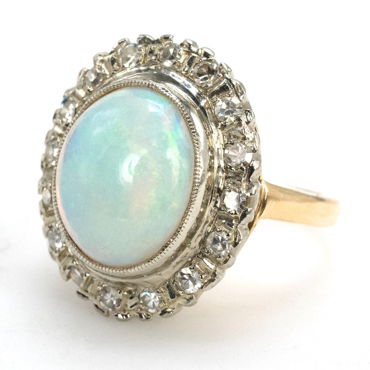 Vintage Gold Oval Opal Ring with Diamond Halo Surround