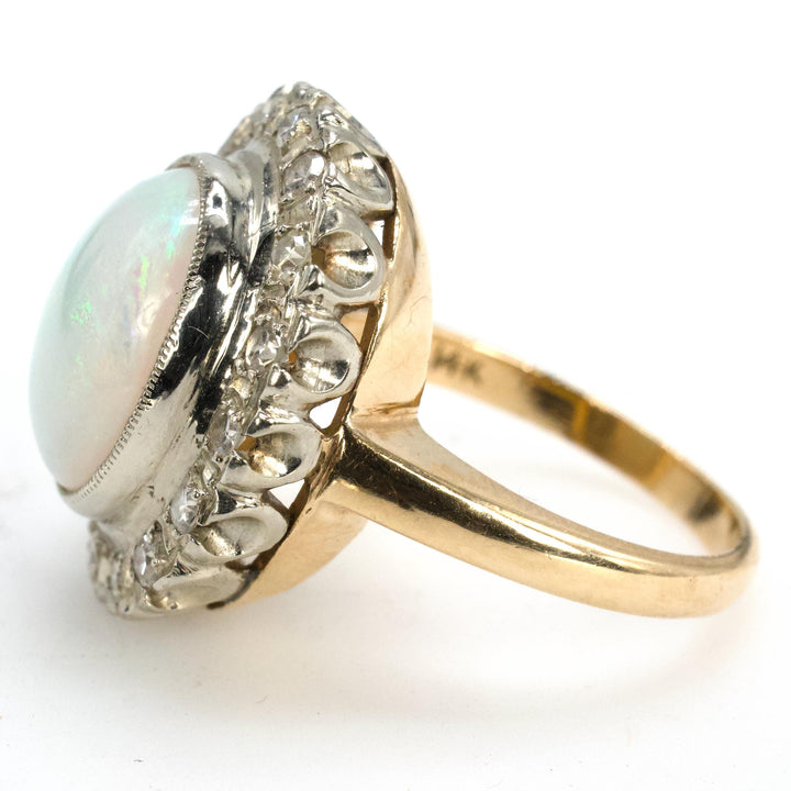 Vintage Gold Oval Opal Ring with Diamond Halo Surround