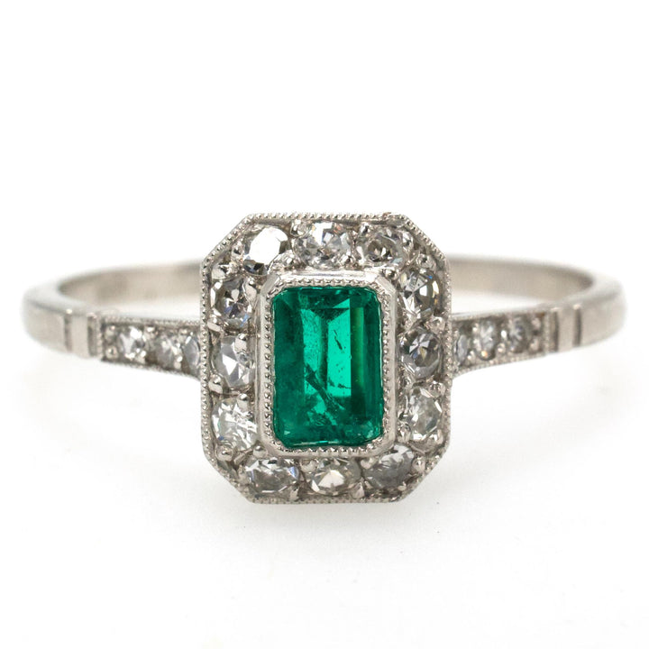 Petite Edwardian Style Emerald and Diamond Halo Ring in Platinum