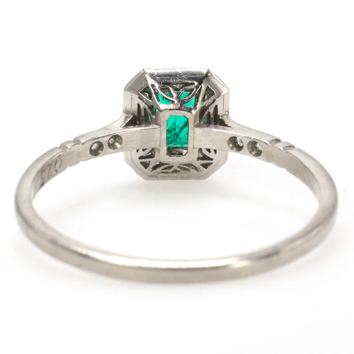 Petite Edwardian Style Emerald and Diamond Halo Ring in Platinum