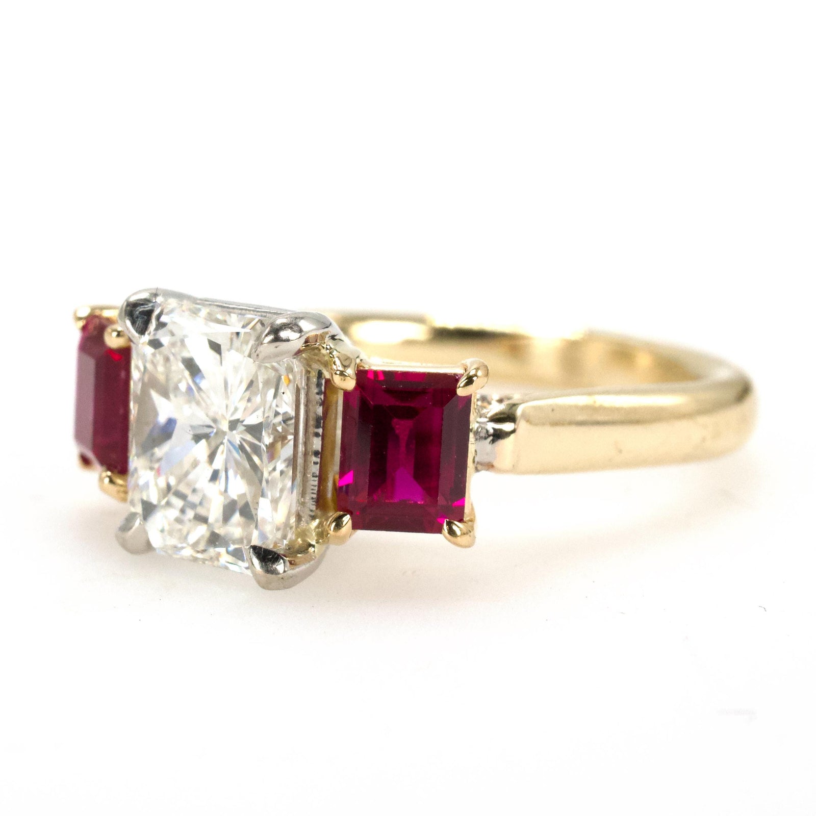 1.47 Carat Radiant Cut Diamond Three Stone Engagement Ring with Rubies in Two-Tone Gold
