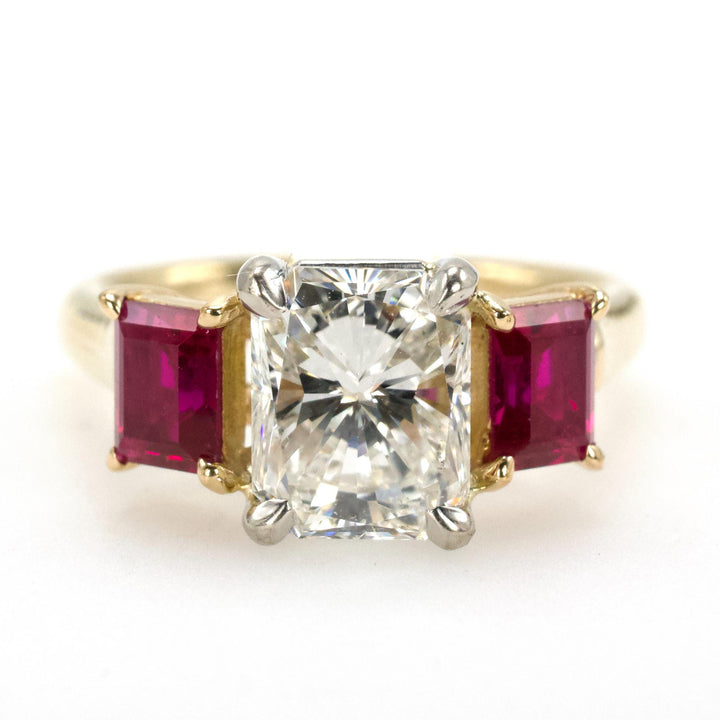 1.47 Carat Radiant Cut Diamond Three Stone Engagement Ring with Rubies in Two-Tone Gold