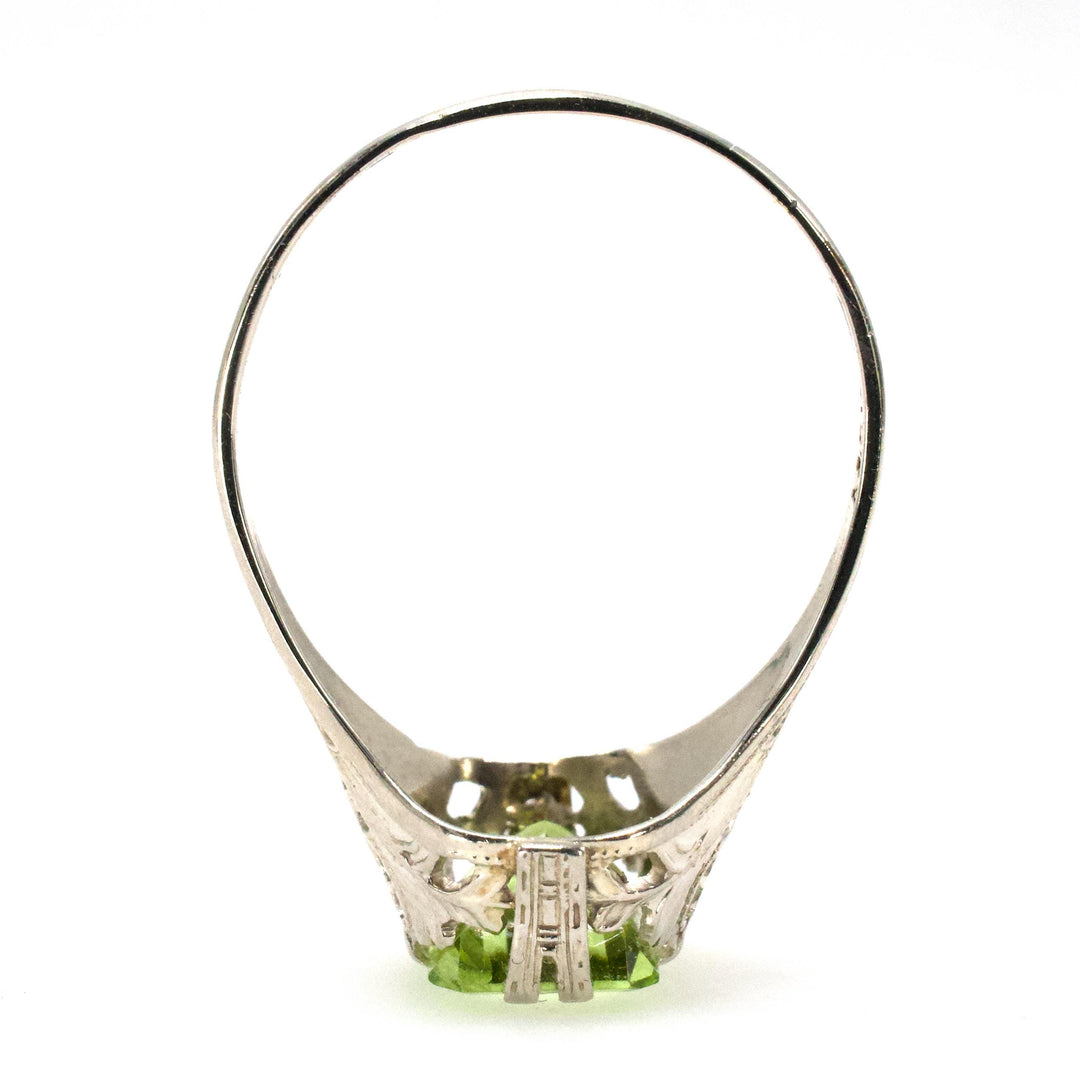 1.75 Carat Emerald Cut Peridot in 1930s Art Deco White Gold Filigree Setting