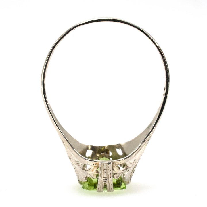 1.75 Carat Emerald Cut Peridot in 1930s Art Deco White Gold Filigree Setting