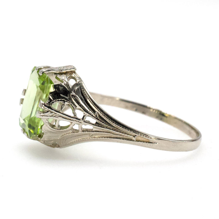 1.75 Carat Emerald Cut Peridot in 1930s Art Deco White Gold Filigree Setting