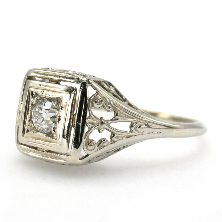 Art Deco Filigreed Solitaire Engagement Ring with 0.17 Carat European Cut Diamond