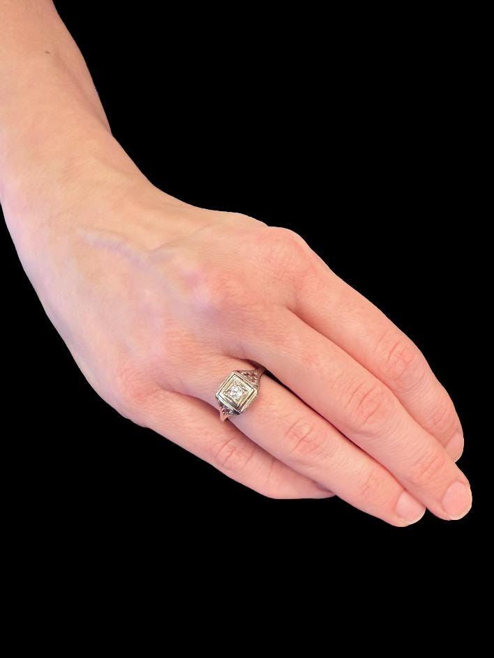 Art Deco Filigreed Solitaire Engagement Ring with 0.17 Carat European Cut Diamond