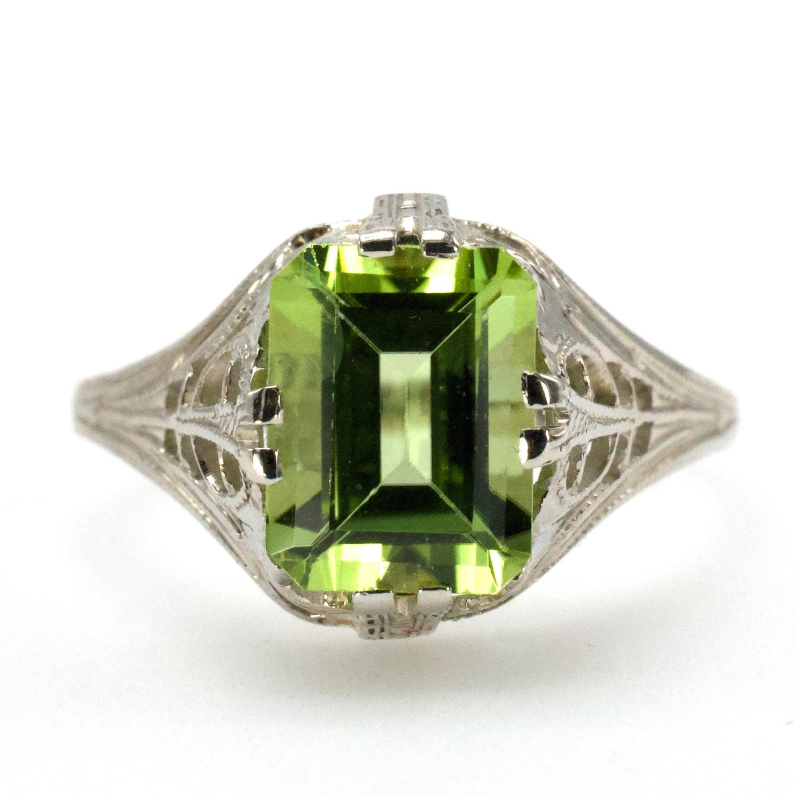 1.75 Carat Emerald Cut Peridot in 1930s Art Deco White Gold Filigree Setting