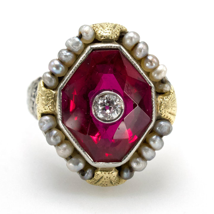 Art Deco Two-Tone Gold Filigree Ring with Lozenge Cut Ruby and Inset Diamond