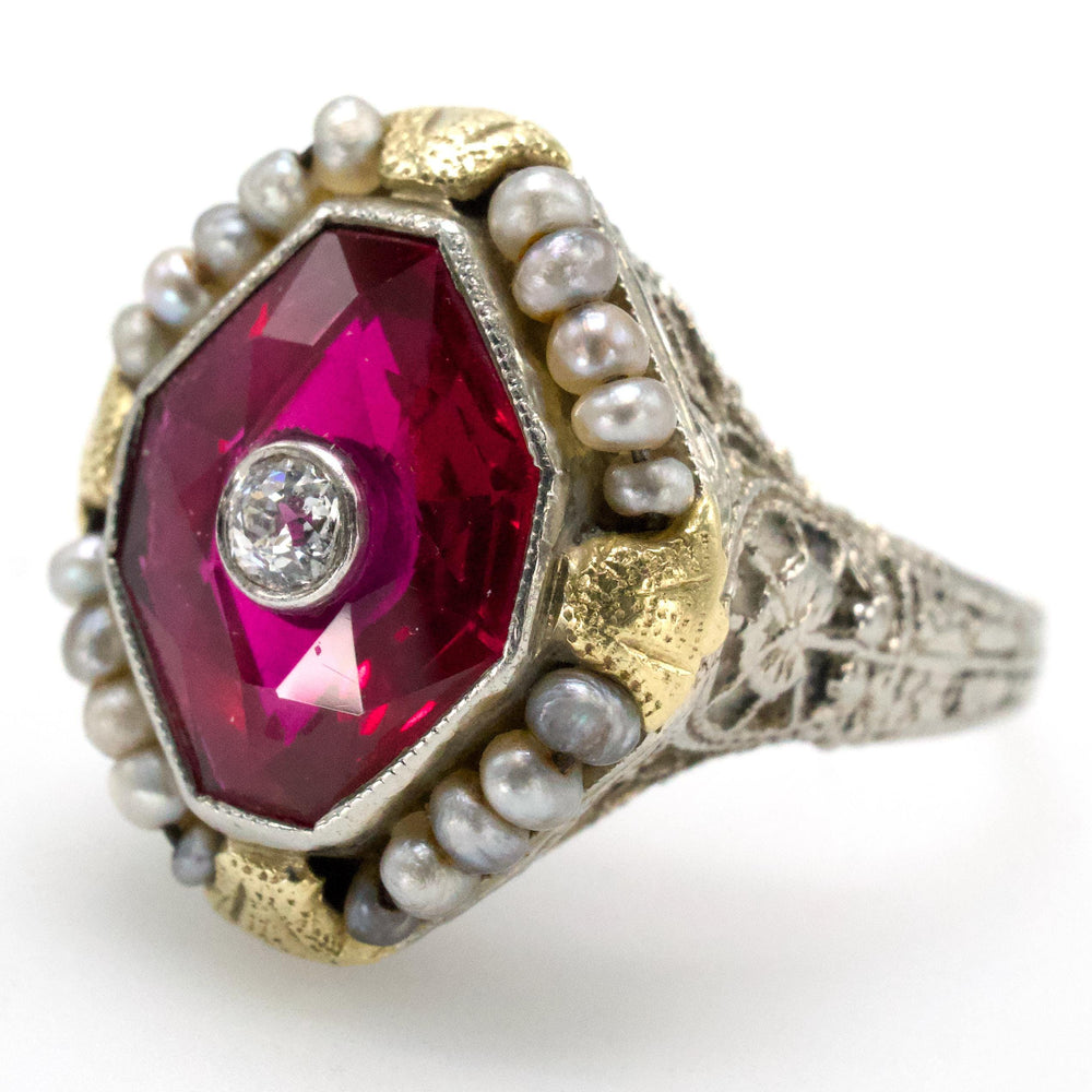 Art Deco Two-Tone Gold Filigree Ring with Lozenge Cut Ruby and Inset Diamond
