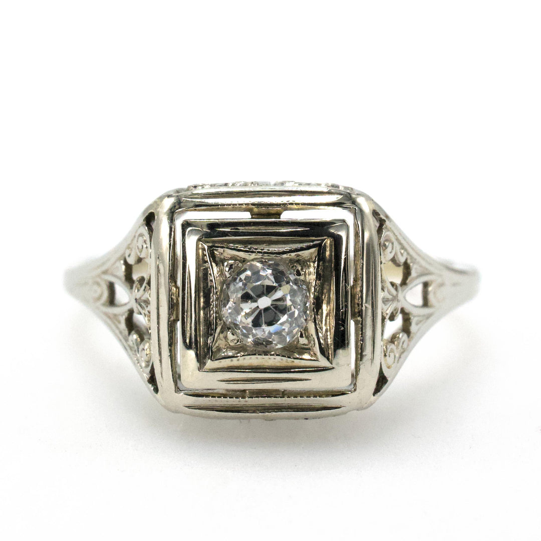 Art Deco Filigreed Solitaire Engagement Ring with 0.17 Carat European Cut Diamond