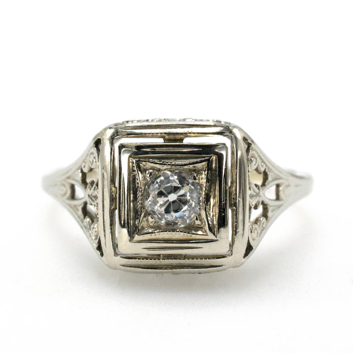 Art Deco Filigreed Solitaire Engagement Ring with 0.17 Carat European Cut Diamond