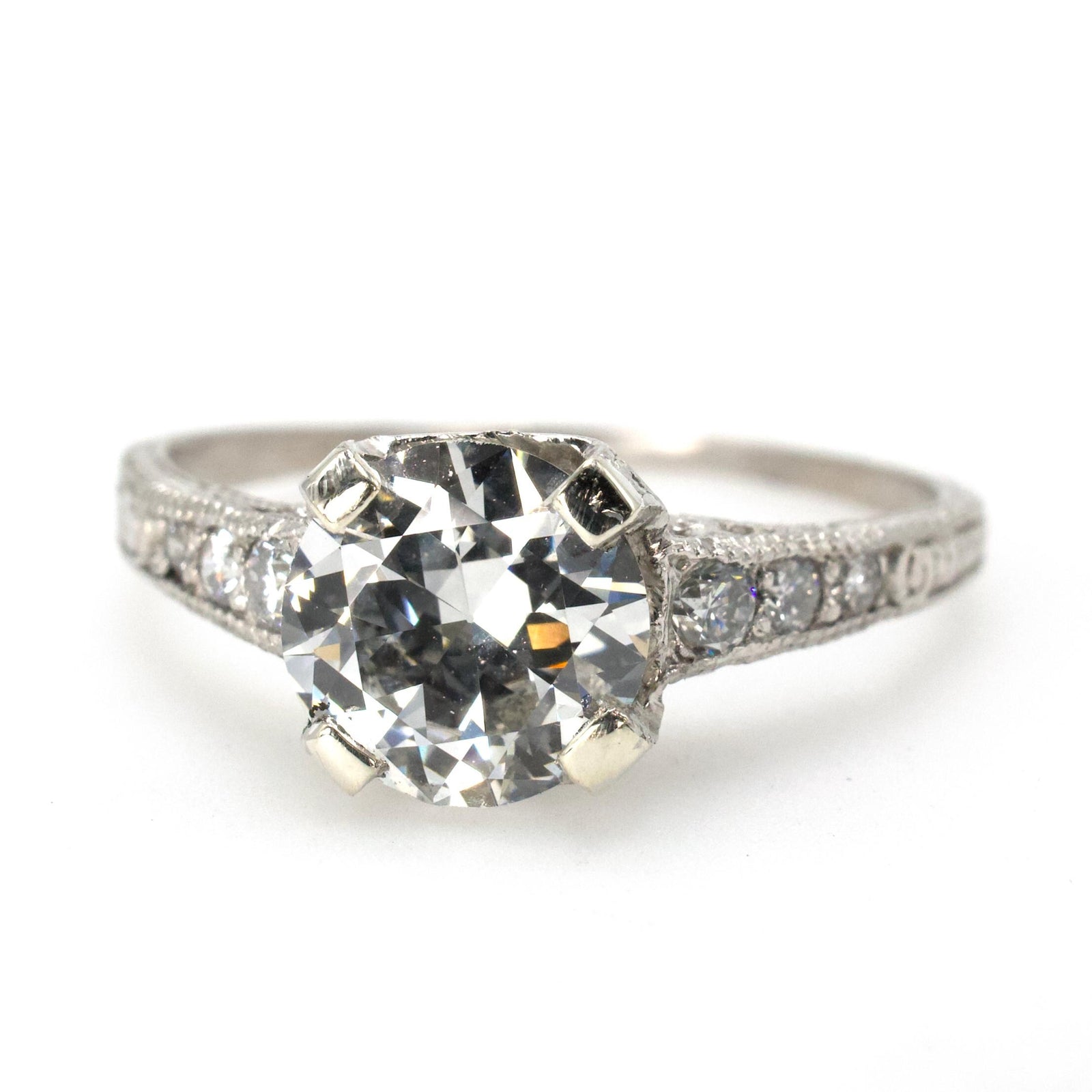 Art Deco Diamond Accented Platinum Solitaire with 1.20 Carat Transition Cut Diamond