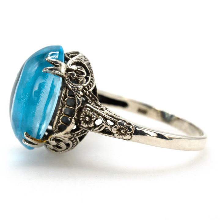Estate Edwardian Style Filigree Solitaire in Sterling Silver with Cabochon Blue Topaz