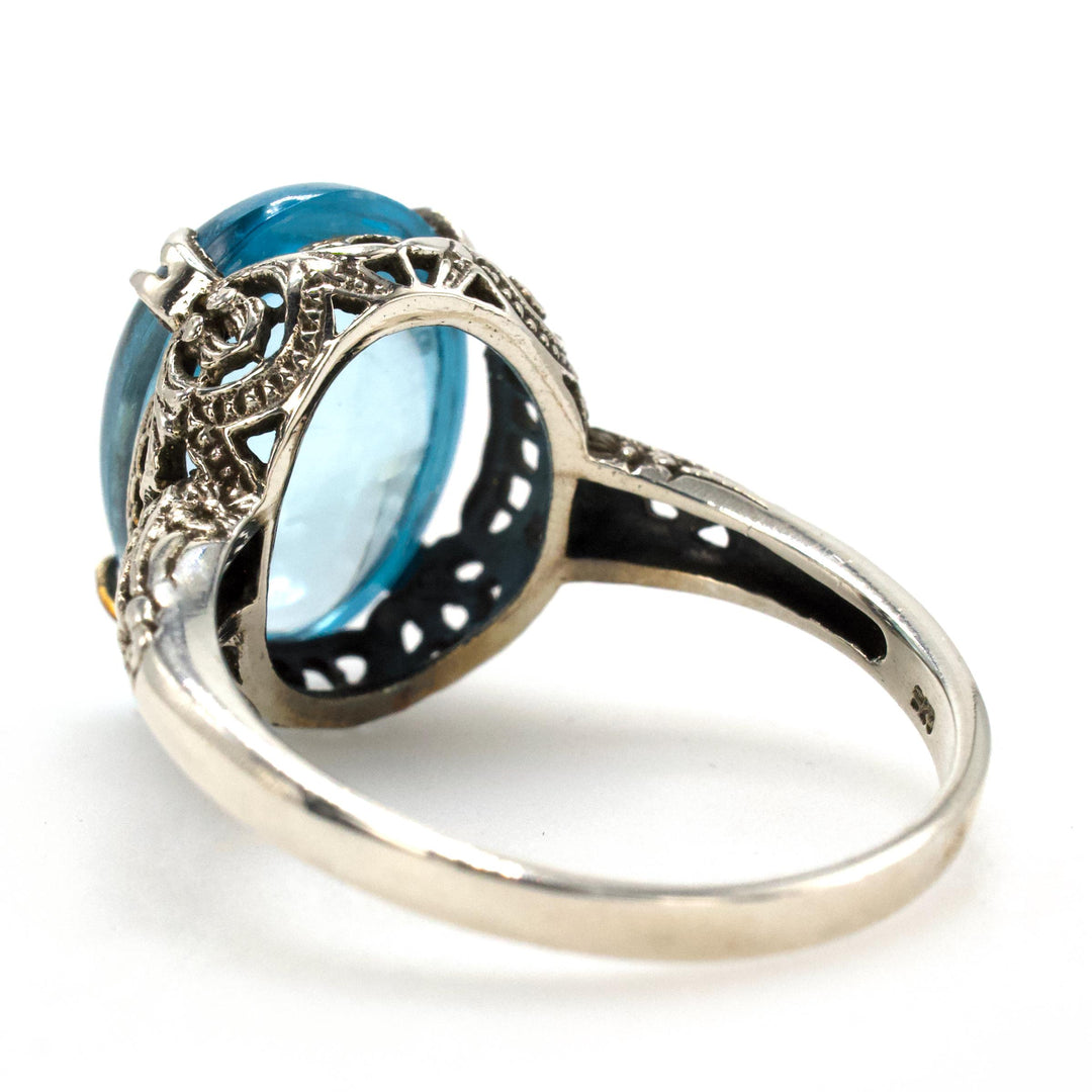 Estate Edwardian Style Filigree Solitaire in Sterling Silver with Cabochon Blue Topaz