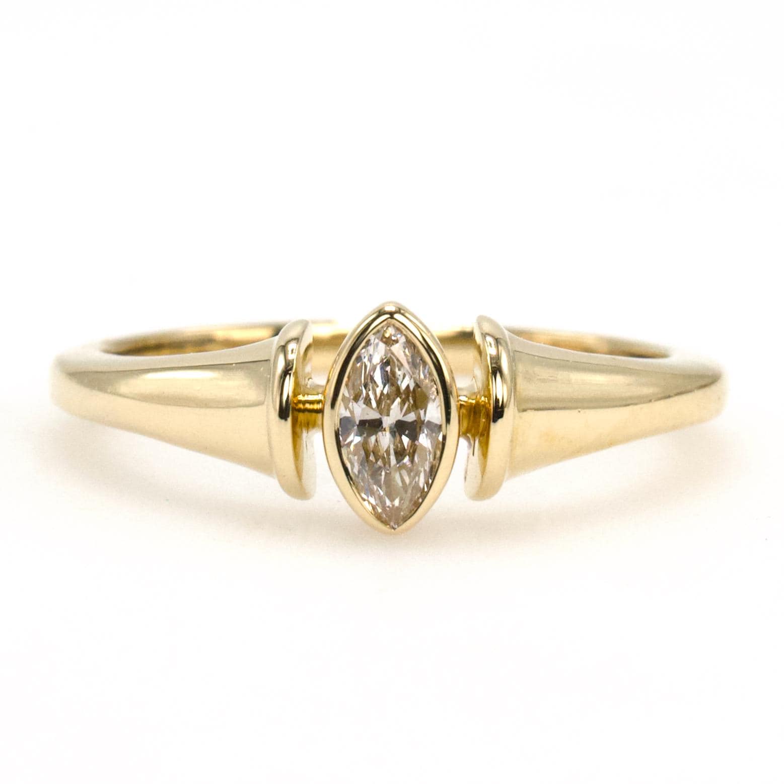 Petite 0.24 carat Marquise Cut Bezel Set Diamond Solitaire