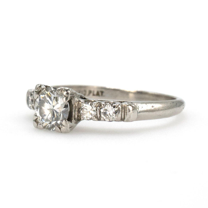 Midcentury Platinum Diamond Engagement Ring with Transitional Cut Diamond and Four Accent Diamonds