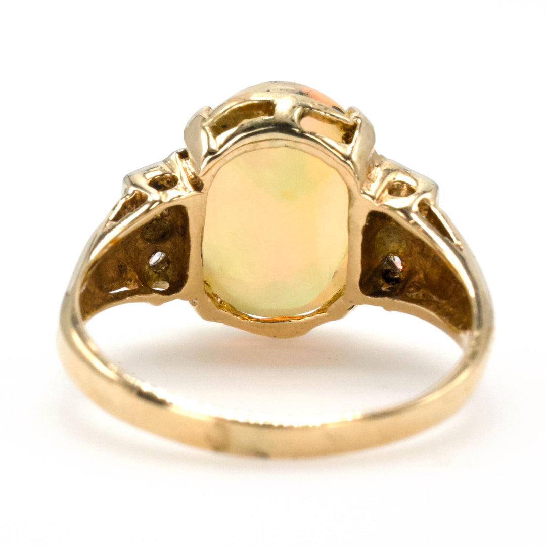 Victorian Gold Jelly Opal Ring with Single and European Cut Accent Diamonds