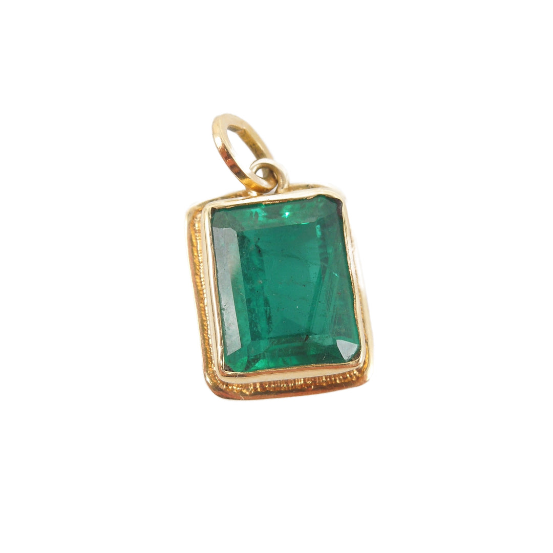 4.00 ct Emerald Cut Colombian Emerald in Yellow Gold Bezel