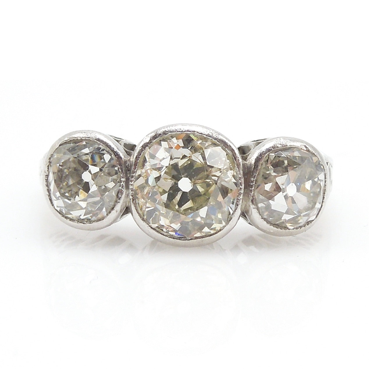 Edwardian Platinum Diamond Three Stone Ring: 2.82ct Filigree & Bezel Set