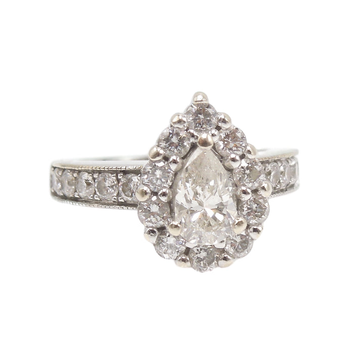 0.61ct Pear Cut Diamond in White Gold with Diamond Halo