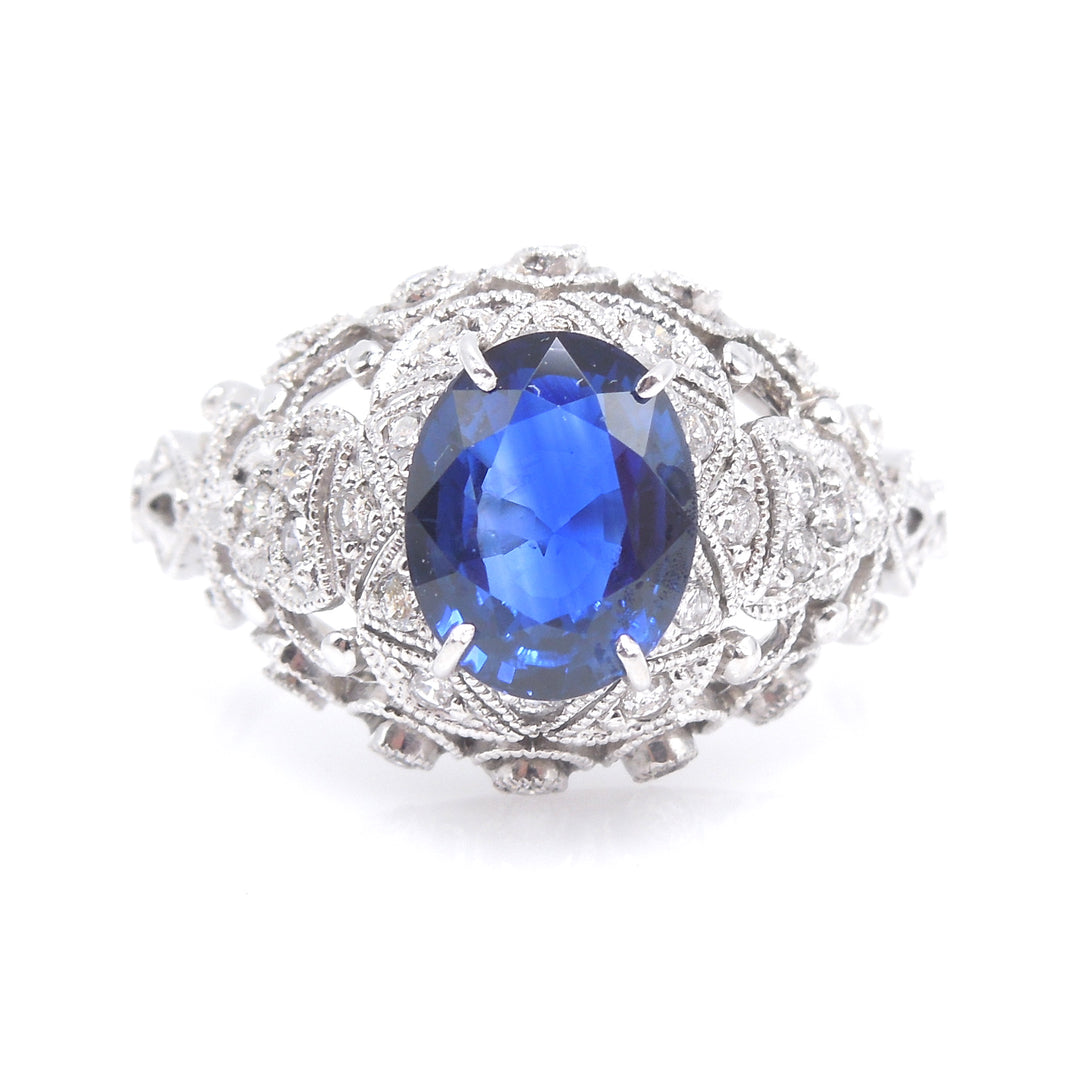 Vintage 1.5 Carat Oval Sapphire in 18K White Gold and Diamond Mounting