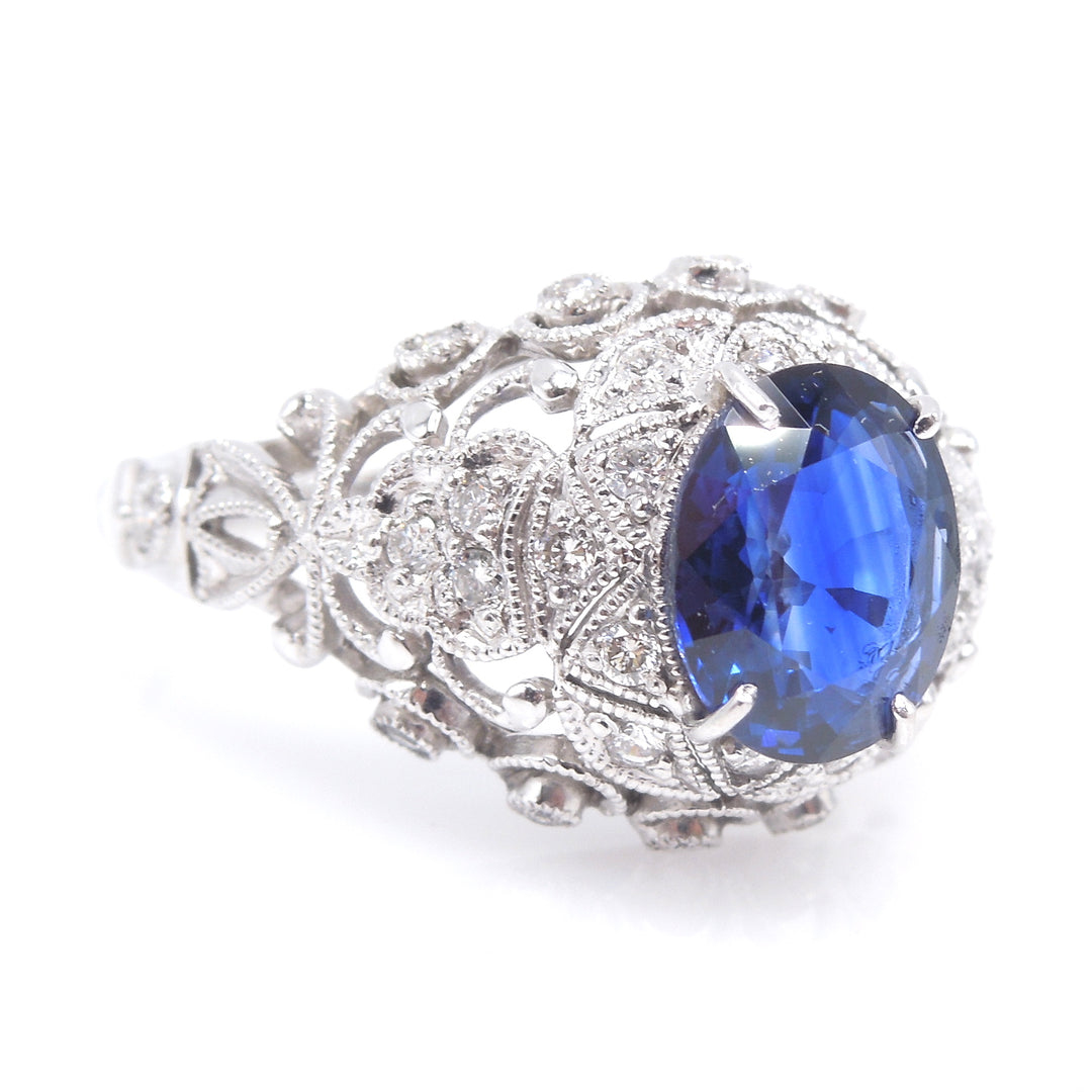 Vintage 1.5 Carat Oval Sapphire in 18K White Gold and Diamond Mounting