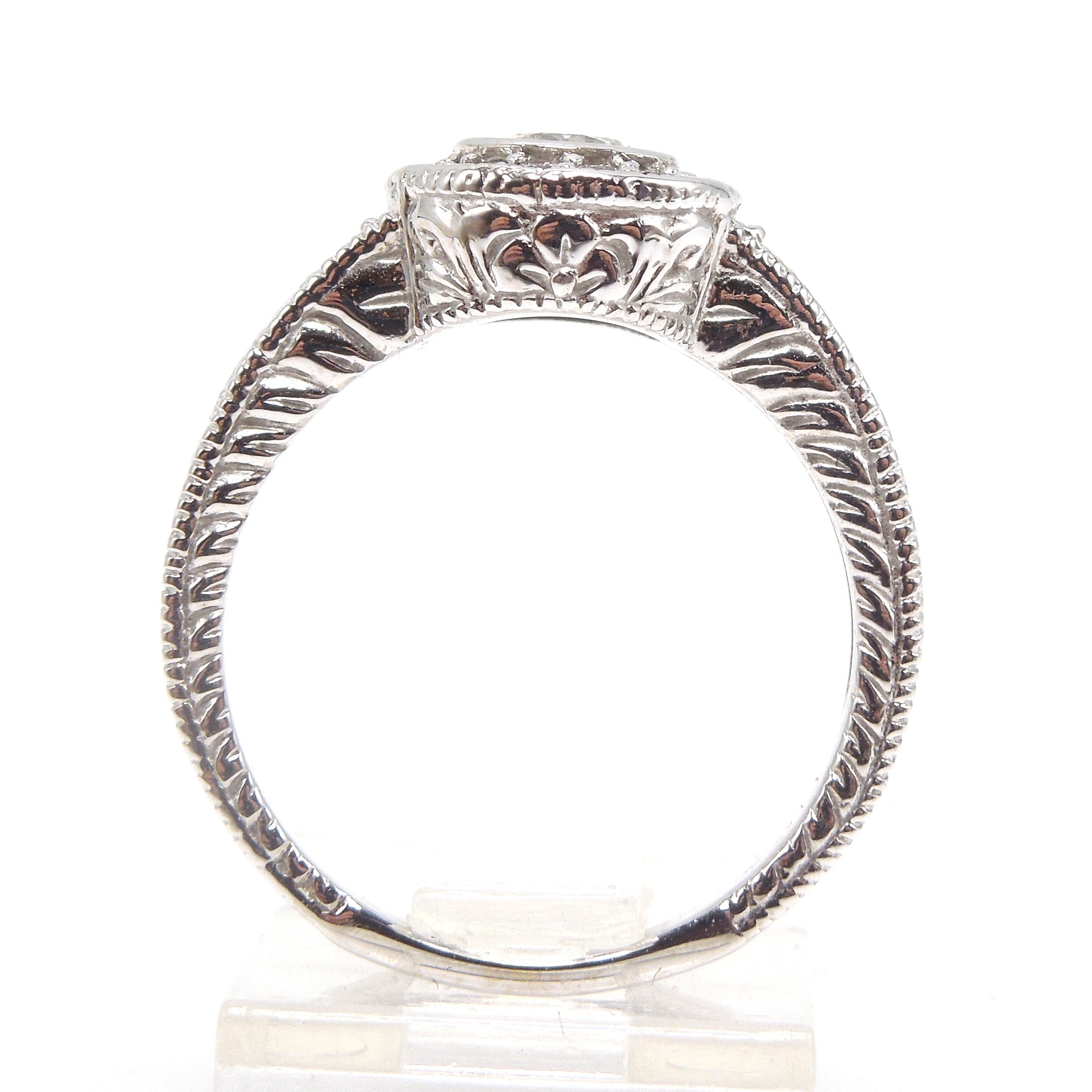 Half Carat Diamond Halo Engagement Ring in 18K White Gold