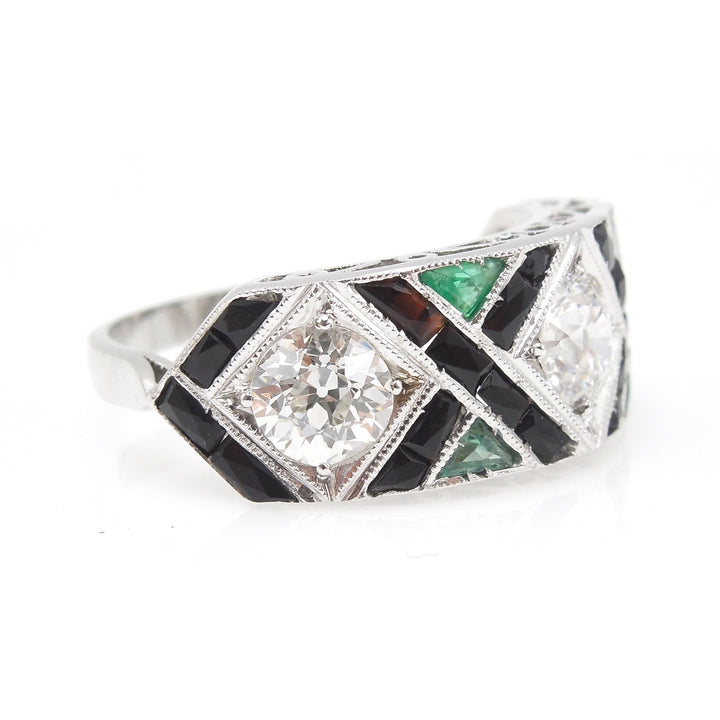 Art Deco Three Stone Ring with Old European Cut Diamonds, Triangular Emeralds and French Cut Onyx