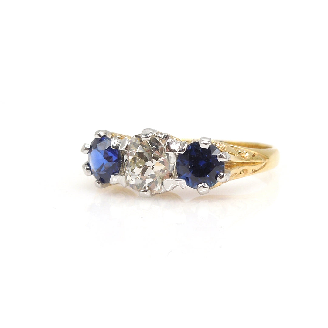 Edwardian Platinum and Yellow Gold Three Stone Ring with Sapphires